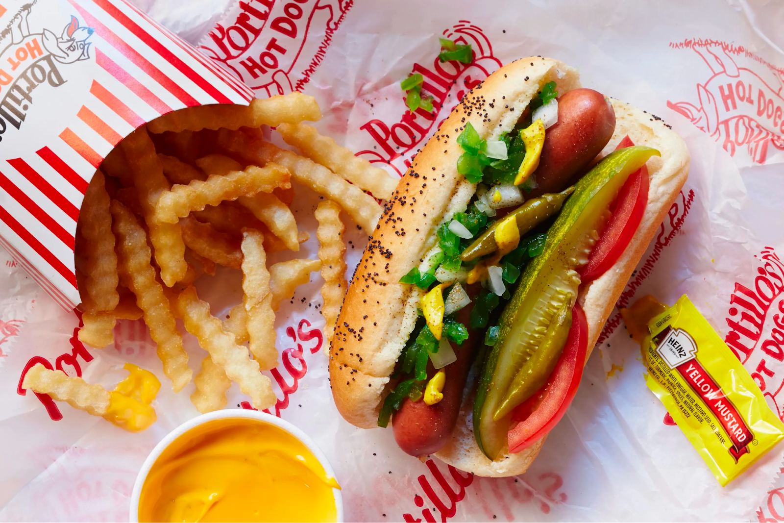 Portillo's is the go-to for iconic Chicago-style hot dogs and delicious Italian beef sandwiches, offering hearty comfort food in a fun, casual atmosphere for an authentic Chicago experience.