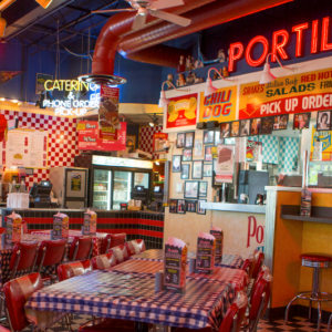 Portillo's Hot Dogs epitomizes Chicago tradition with its iconic Chicago-style hot dogs and succulent Italian beef sandwiches, serving comfort food in a lively, relaxed setting for a genuine taste of Chicago.