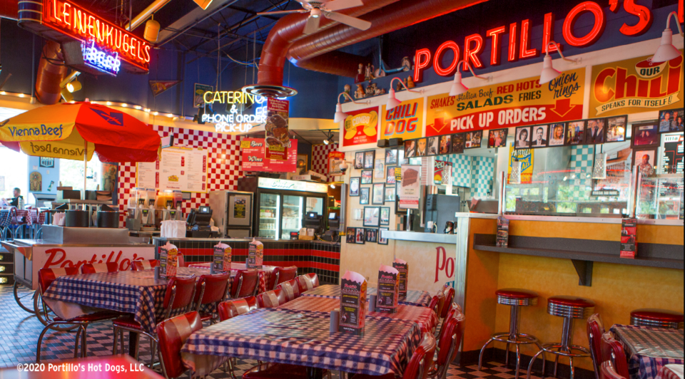 Portillo's Hot Dogs epitomizes Chicago tradition with its iconic Chicago-style hot dogs and succulent Italian beef sandwiches, serving comfort food in a lively, relaxed setting for a genuine taste of Chicago.